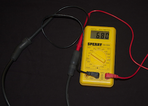 ohm meter with spark plug wires